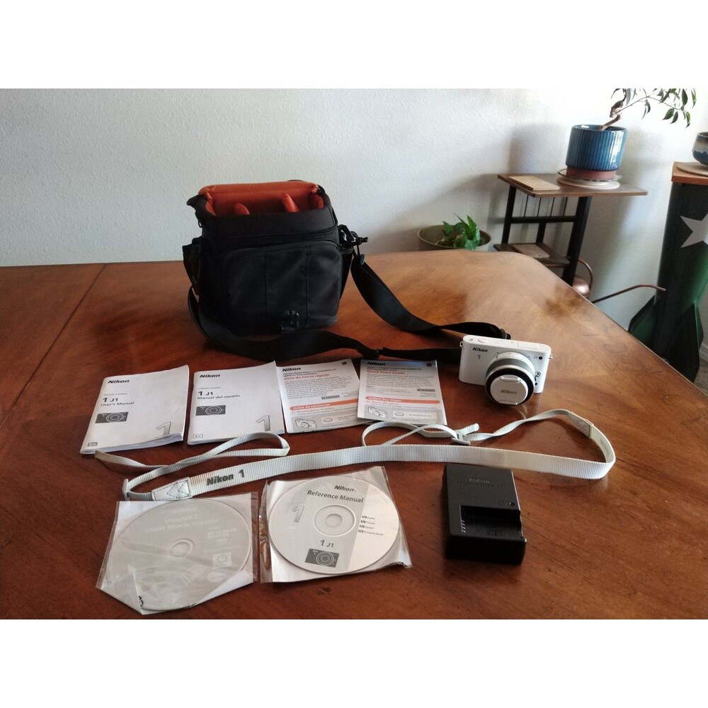 READ* Nikon 1 J1 White Digital Camera with 1 NIKKOR 10-30mm VR Lens